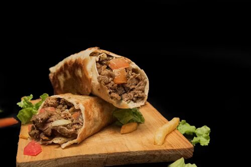 B&B Special Shawarma roll loaded with chicken and vegetables